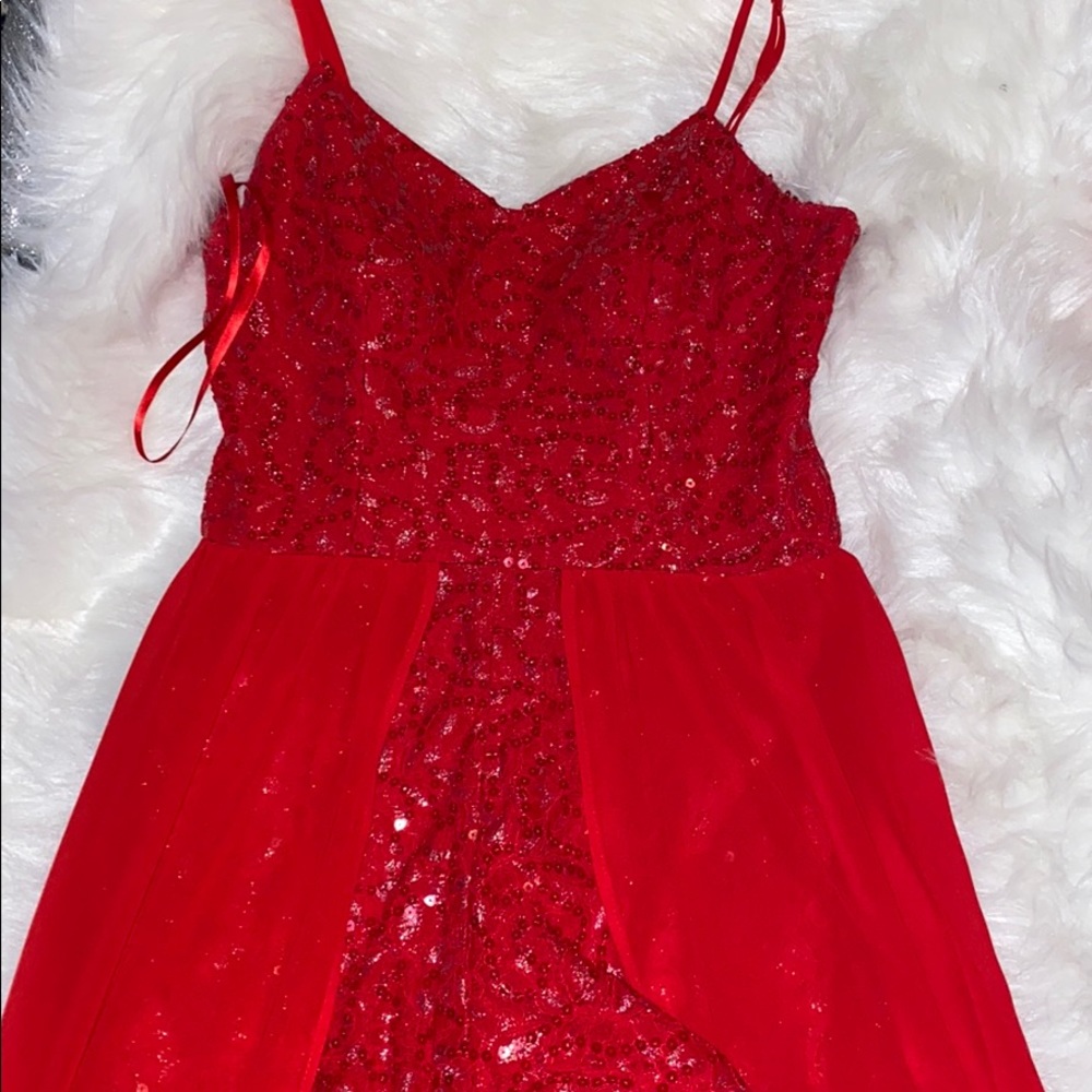Red romper w/ train